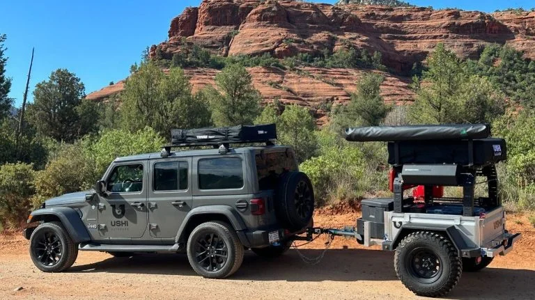 USHI trailer towed by a Jeep