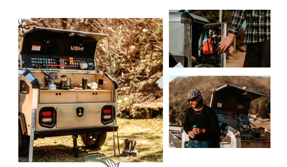 Rear kitchen setup and camp scene with the trailer